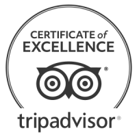 A TripAdvisor “Certificate of Excellence” badge with a circular emblem and target/eye icon.